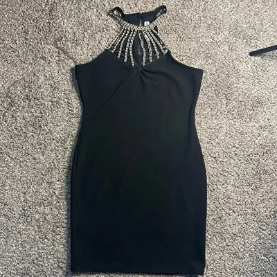 Mini vestido halter Almost Famous para mujer talla S elástico negro espalda abierta ceñido al cuerpo Foto 1 de 4