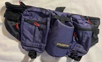 Riñonera Stansport púrpura y negra, bolsillos con cremallera, portabotellas para latas Foto 1 de 4