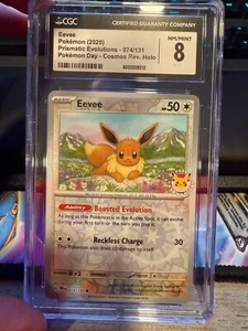 Eevee Pokemon Day Reverse Cosmos Holo 074/131 Prismatic Evolutions CGC 8 NM/Mint - Picture 1 of 2