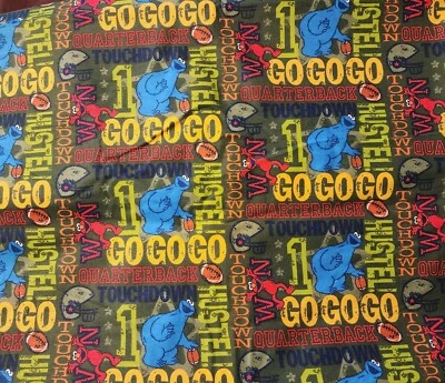 3.5 YDS~OOP~2007 Sesame Workshop flannel~Sesame Street Cookie Monster Football - Image 1 of 4