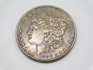 1886 UNITED STATES OF AMERICA MORGAN SILVER DOLLAR - Picture 1 of 4