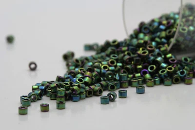 Miyuki Delicas 11/0 Metallic Green Luster Seed Beads DB-027 - Image 1 of 2