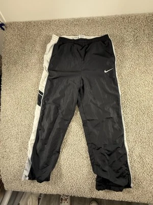 Pantalones NIKE Vintage Negros Juveniles XL Atléticos Años 90 Nylon Cortavientos Niños Foto 1 de 4
