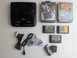 Console Sega Mega Drive 2 + 7 giochi (EA Hockey, Sonic The Hedgehog 2, Mega G..) - Foto 1 di 20