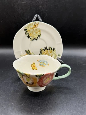 Juego de tazas y platillos Anthropologie Shelley Hesse pétalos de acuarela Foto 1 de 4