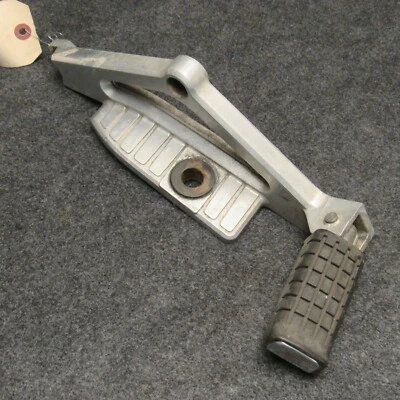 1983-1985 1984 Honda Nighthawk CB650SC LH Rear Foot Peg w/Bracket OEM 16152 - Image 1 of 4