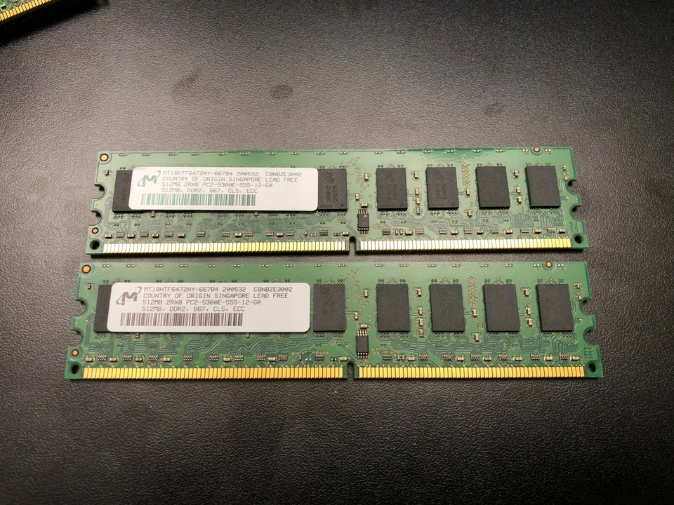 Micron PC2-5300E 1GB (2x512) MB DIMM 677 MHz ECC DDR2 Memory MT8HTF6472AY-667B4 - Image 1 of 1