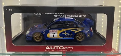Modellino auto AUTOart Subaru Impreza WRC 03 1/18 Monte Carlo Solberg Mills - Immagine 1 di 4