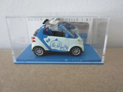 BUSCH SMART CABRIO BABY on BOARD in BLUE - model is PLASTIC - HO or 1:87 scale - Image 1 of 4