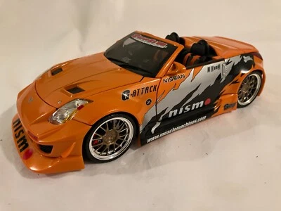 Muscle Machines  2004  Nissan 350Z conv    1/18    Orange, Black, Silver - Image 1 of 3