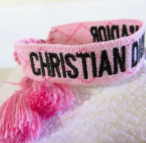 Christian Dior Freundschaftsarmband gewebte Baumwolle J'Adior verstellbar PINK-schwarz - Bild 1 von 8