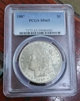 PCGS MS65 1887 Morgan Silver Dollar - Image 1 of 2
