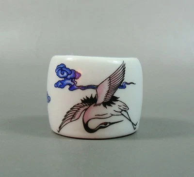 ANILLO ERUDITO ARQUERO PORCELANA FINA con GRÚAS Foto 1 de 4