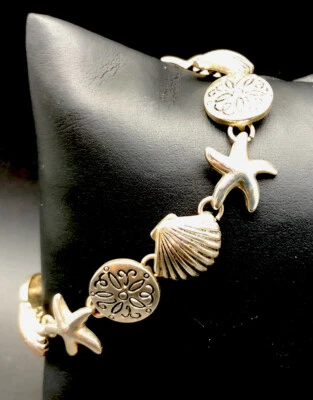 Cute Beach Theme Silver Tone Bracelet Shells Star Fish Toggle Clasp  7" - Image 1 of 4