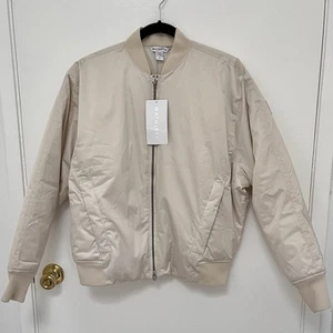 NWT ATHLETA Sateen Bomber Zip Women’s Jacket Cream Medium Water Repellent - Picture 1 of 14