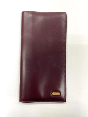 Auténtica billetera de cuero Bally porta billetes rojo vino como está Foto 1 de 4