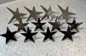 Juego de 12 servilleteros estrella martillada plateados incluidos 4 grandes y 8 pequeños - Imagen 1 de 10