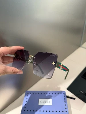 Gafas de sol Gucci retro rectangulares sin marco para exteriores 5186/63-16-140 mm Foto 1 de 4