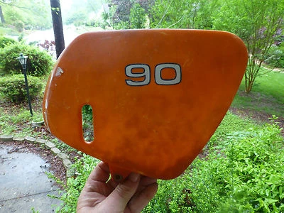 Kawasaki 90 g 3 90 1973 cubierta lateral naranja  Foto 1 de 4