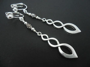 A PAIR OF TWISTY  TIBETAN SILVER  LONG DANGLY CLIP ON EARRINGS. NEW.  - Picture 1 of 1