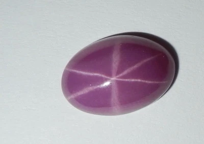 Opaque Star Ruby Oval 12x8 mm Cabochon 6 Rayed Lab-created Stone 1 piece Lot - Image 1 of 4