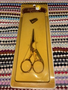Tijeras bordadas cigüeña vintage nuevas en stock en embalaje original grúa abrigos J&P dorados - Imagen 1 de 4