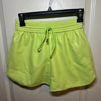 A.L.C. Nuevo iluminador de neón con bolsillos cortos de cuero sintético Rex talla 2 para mujer $275 Foto 1 de 3