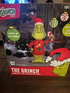 4 ft. LED Grinch in Ugly Sweater with Candy Cane Christmas Airblown Inflatable - Picture 1 of 5