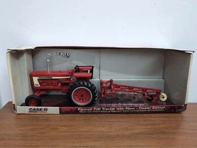 1/16 Ertl Farm Toy Farmall 706 Tractor With Plow Dealer Edition Set - Image 1 of 4
