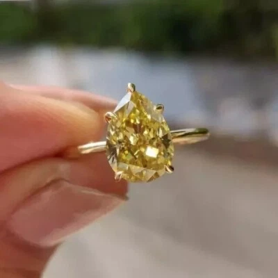 Solitario de diamantes canarios creado en laboratorio corte pera de 1 quilate acabado en oro amarillo de 14 quilates Foto 1 de 3