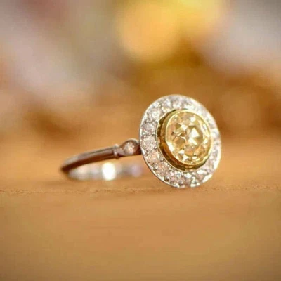 Anillo de compromiso enchapado en plata 935 piedra amarilla forma redonda de 4,10 quilates creado en laboratorio Foto 1 de 4