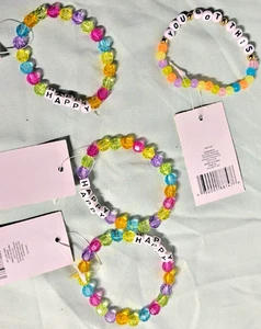 4 Pack Bracelets New With Tags - Picture 1 of 1
