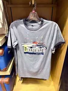 Camiseta retro azul claro de los parques de Disney Disneyland Hotel Ringer XS S M L XL 2XL 3XL - Imagen 1 de 1