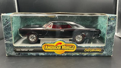 Pontiac GTO 1966 ERTL American Muscle escala 1:18 fundido a presión modelo con interior rojo Foto 1 de 4