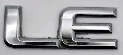1999-2004 Nissan Pathfinder LE REAR TRUNK LID HATCH EMBLEM BADGE LOGO OEM - Image 1 of 3