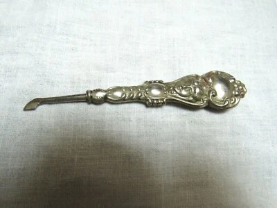 Antigua herramienta de manicura Art Nouveau con mango de ley cara de dama 4,5" Foto 1 de 4