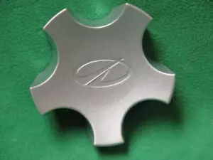 9593054 GM WHEEL CENTER CAP ORNAMENT 1998-2003 OLDSMOBILE INTRIGUE SILHOUETTE - Picture 1 of 1