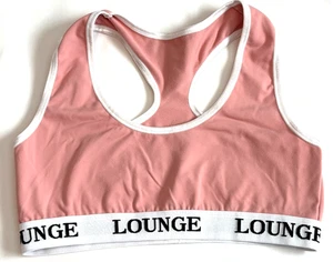 Reggiseno sportivo lounge donna medio racerback rosa e bianco senza fili sfoderato palestra - Foto 1 di 6