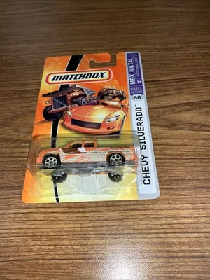 Оранжевый игрушечный грузовик Chevy Silverado Matchbox MBX Metal (2007) No68 - Изображение 1 из 4