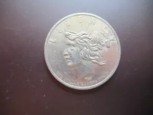 Regency Resort Casino $1 One Dollar Gaming Token Chip Peace Silver Dollar - Picture 1 of 3