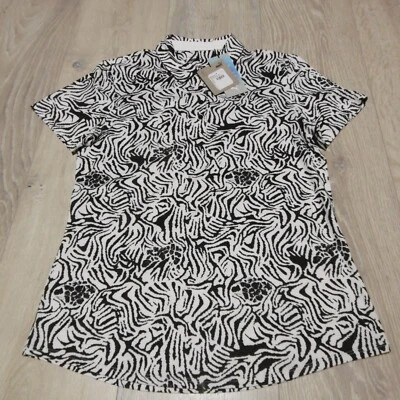 Polo de golf Puma para mujer talla pequeña blanco Puma negro SS cebra hilada en la nube Foto 1 de 4