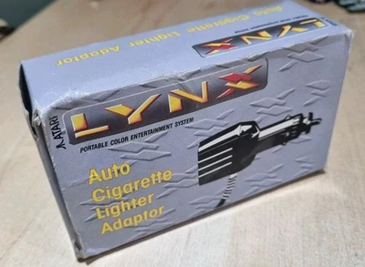 Atari Lynx Cigarette Lighter Adapter Brand New Old Stock.Box Creases - Image 1 of 4