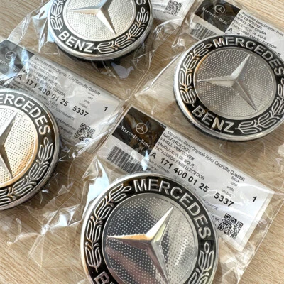 Juego de 4 cubiertas de cubo de rueda Mercedes Benz estrella con corona de laurel negro 171 400 01 25 Foto 1 de 4
