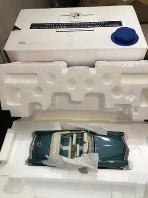 Franklin Mint 1956 Ford Lincoln Continental Convertible Teal Model Car - 1:24 - Image 1 of 4