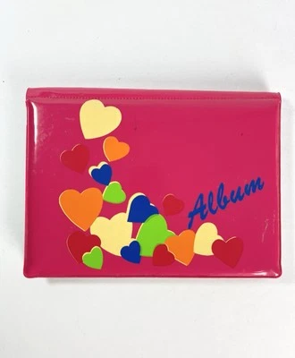 "Álbum de fotos vintage de vinilo hinchado rosa caliente de 3,5x5"" Brag Book de los años 80" Foto 1 de 4