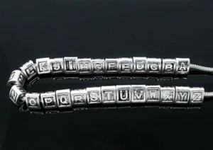 Perle LETTRE A-Z alphabet 7mm trou 5mm métal argenté anneau triangle serpent K27 - Picture 1 of 42