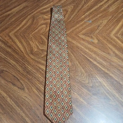 ¡Haz una oferta! Corbata texturizada marrón y verde Joseph Abboud con patrón geométrico Foto 1 de 3