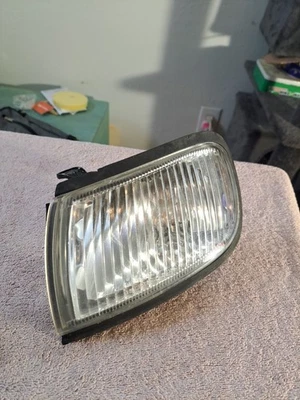 1997-1999 Nissan Maxima Drivers Side Corner Marker Turn Signal Light - Image 1 of 4