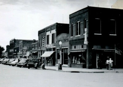 Horton, Kansas RPPC Hamburger Inn Coca Cola Rexall Drugs Soda USA Flag Cars  - Image 1 of 3