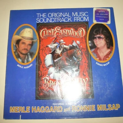 STILL SEALED 33 RPM LP RECORD - SOUNDTRACK - BRONCO BILLY - MERLE HAGGARD/RONNIE - Image 1 of 2